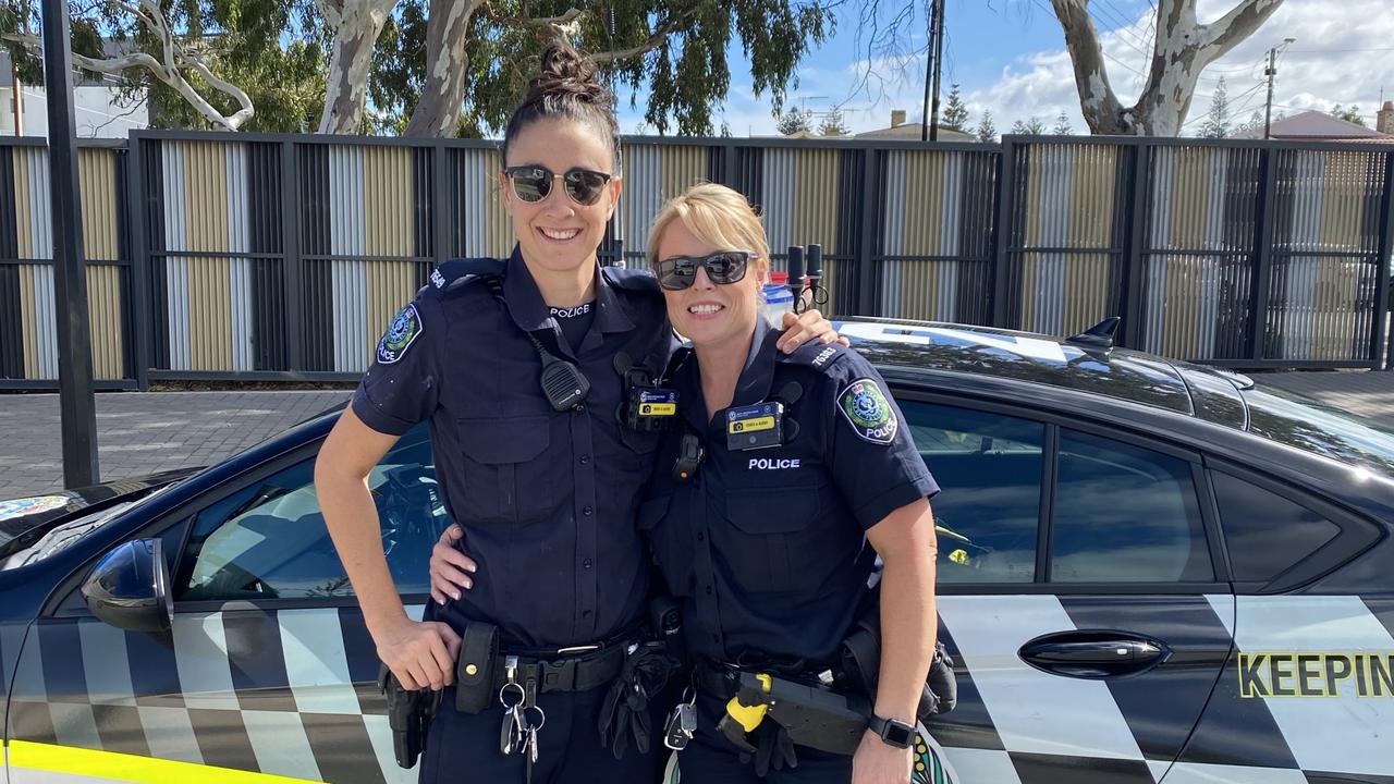 Newly drafted St Kilda AFLW player Leah Cutting (left) during her time as a police officer in South Australia.