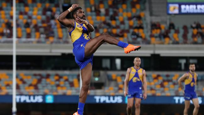 West Coast’s Liam Ryan kicks a second-quarter goal at the Gabba. Picture: Michael Klein