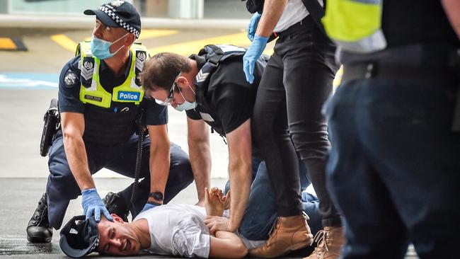 Police arrested several people during the protest. Picture: Jake Nowakowski