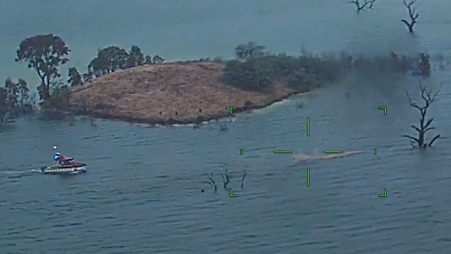 Police vision of the rescue at Lake Eildon after a boat capsized. Picture: Victoria Police