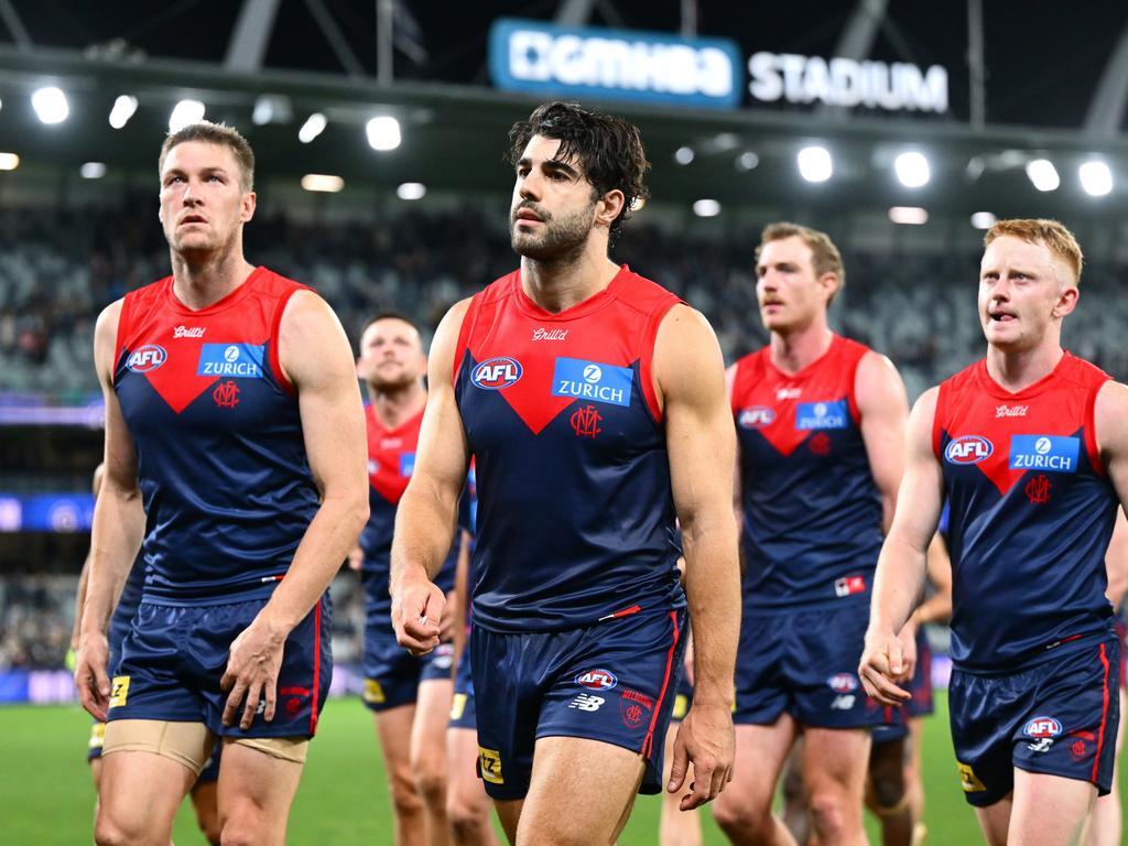 Melbourne players trudge off after a fourth-straight defeat to start 2025.
