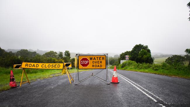 Rain has caused Eltham Rd in Eltham to close due to flooding on Friday. Photo: NCA NewsWire/ Elise Derwin