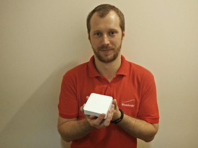 Bogdan Botezatu, senior e-threat analyst at Bitdefender, with the Box - a device that stops hackers from entering your home network via a fridge or other connected device.