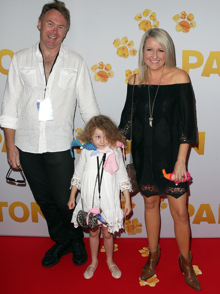 Ten’s entertainment reporter Angela Bishop arrives with her family at the Australian premier of Paddington. Picture: Andrew Murray