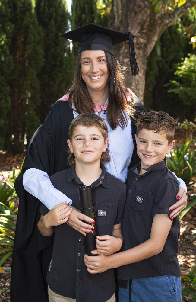 Master of Education (Guidance and Counselling) graduate Kirsten Doecke with sons Taj (left) and Jax at a UniSQ graduation ceremony at The Empire, Tuesday, October 29, 2024. Picture: Kevin Farmer