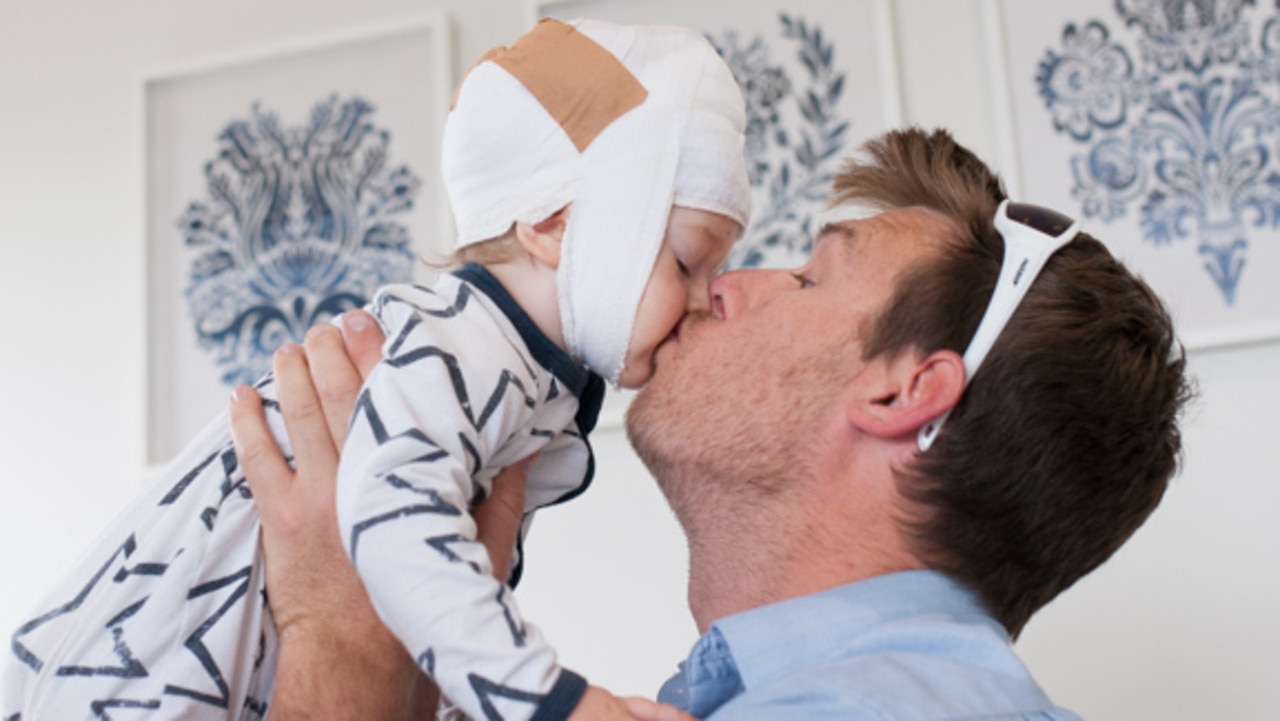 Nixon, pictured with his dad, Nick, underwent 10 rounds of chemotherapy and a surgery to remove the tumour. Picture: Supplied