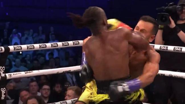 KSI defeats Joe Fournier in the ring.