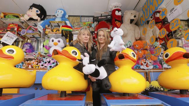 Helen and Michelle Henderson, of Clarendon Vale, keeping busy in side show alley on Saturday. Picture: MATT THOMPSON