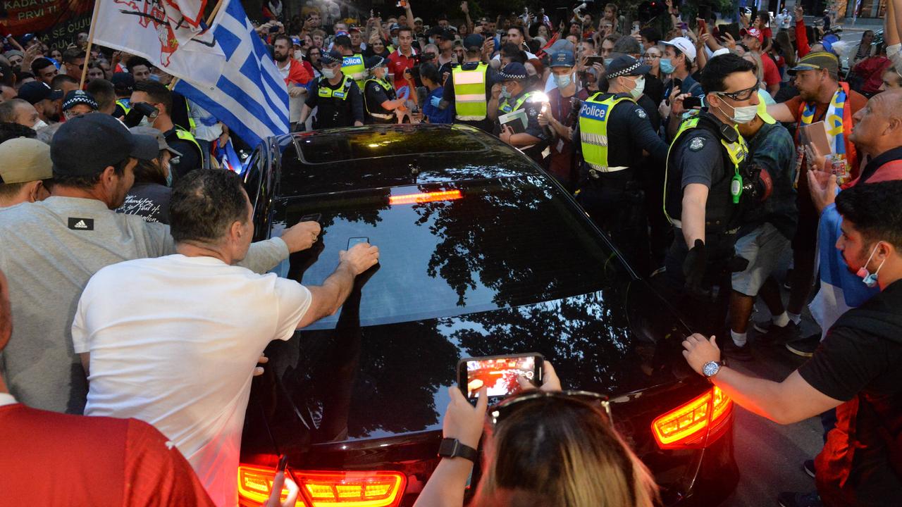 Fans swarmed the car as it attempted to leave. Picture: Josie Hayden