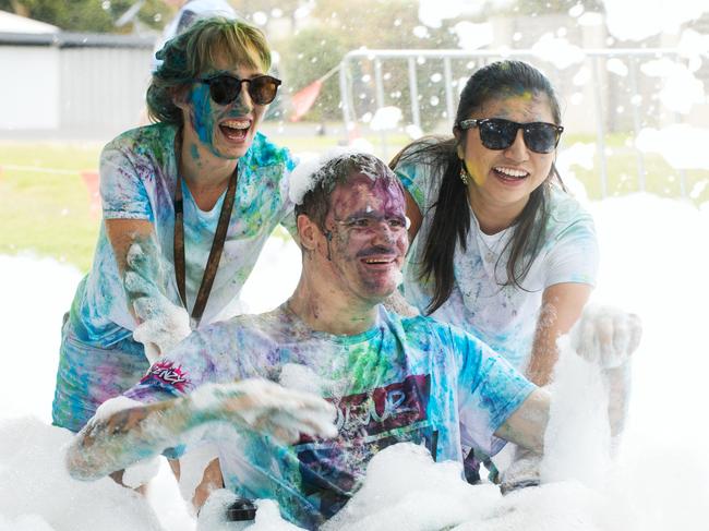 Azrae Hope, Ben Radzevicius and Risa Watanuki from Eimeo at the Mackay Colour Run 2021. Picture: Michaela Harlow