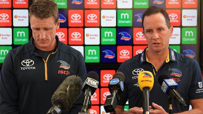 Adelaide Crows football manager Brett Burton and senior coach Don Pyke speak to the media in June. Picture: Daniel Kalisz/Getty Images