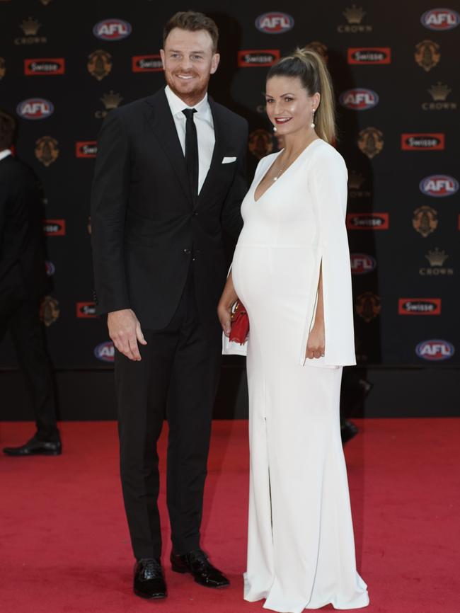 Essendon’s Brendon Goddard and wife Rosie Goddard. Photo: AAP Image/Julian Smith