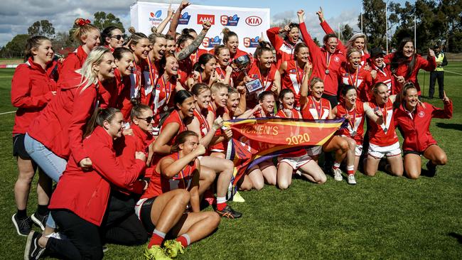 North Adelaide SANFLW players and coaches celebrate after winning the 2020 SANFLW grand final. Picture: Mike Burton