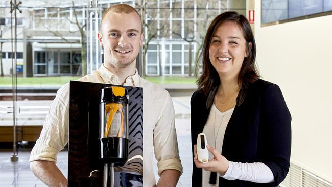 Alexander Ghent and Frederique Sunstrum, from UNSW, with their inventions.