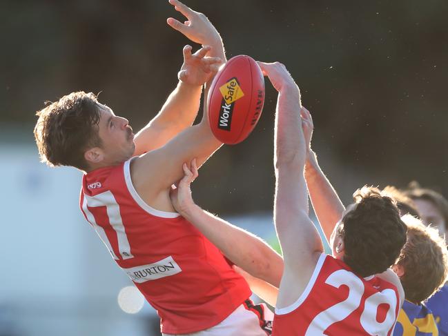 Red Hill defender Jonah Siversen (left) suffered a fractured back in a marking contest earlier this season. Picture: David Crosling