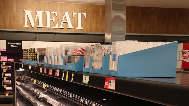 Limited meat stocks during early morning senior shopping at Woolworths, Ashgrove. Picture: Liam Kidston