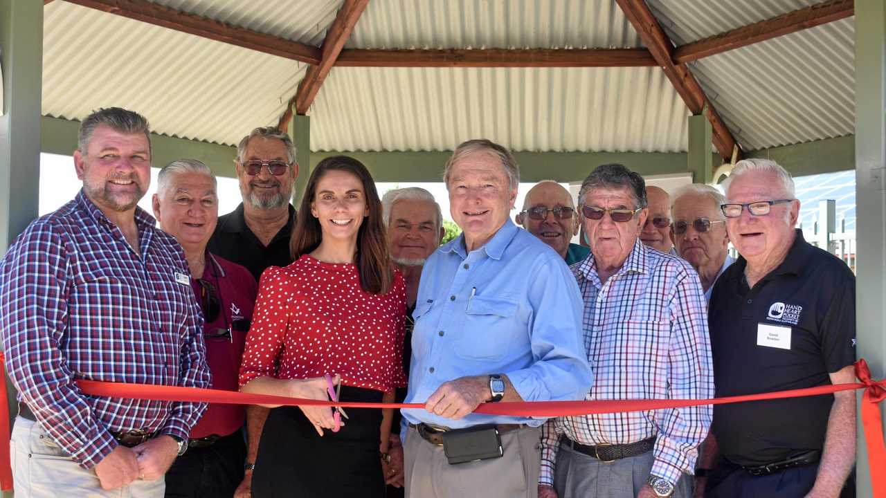 Gary Mark, CEO of Hand Heart Pocket, Melanie Calvert, CEO of Pinaroo, Howard Hobbs, Chairman and members of Roma Freemasons at the opening of a newly landscaped garden at Pinaroo. Picture: Ellen Ransley