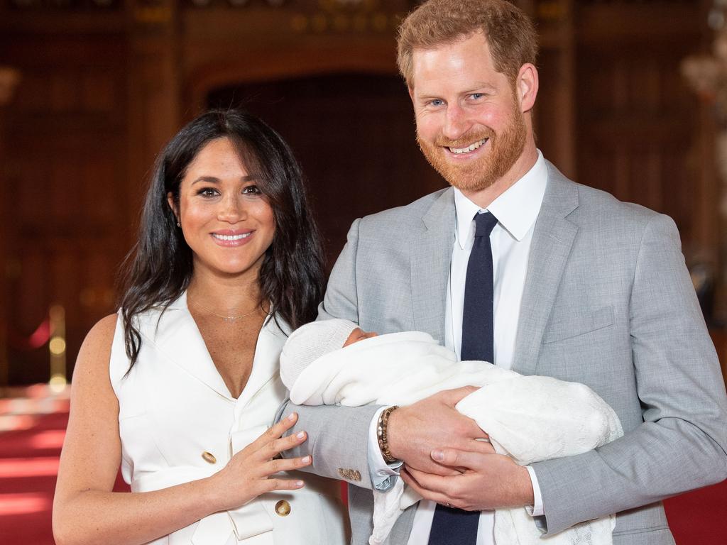 Prince Harry beams holding baby Archie. Picture: Dominic Lipinski / POOL / AFP.