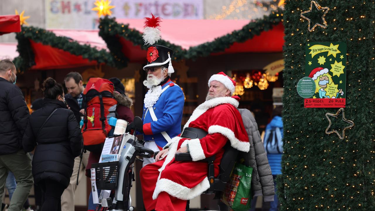 A man dressed as Santa Claus at the annual Christmas market in Cologne, Germany. Picture: Andreas Rentz/Getty Images