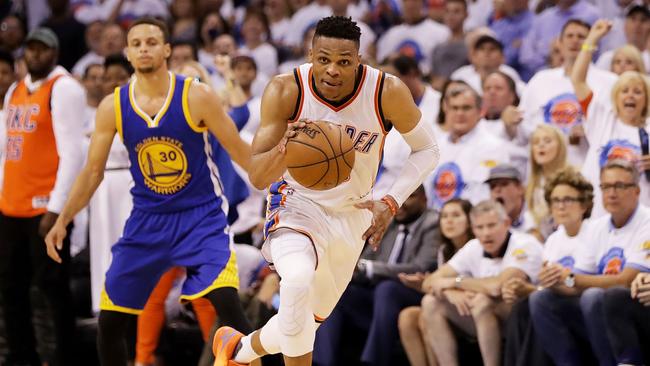 Russell Westbrook of the Oklahoma City Thunder drives against the Golden State Warriors in the third quarter.