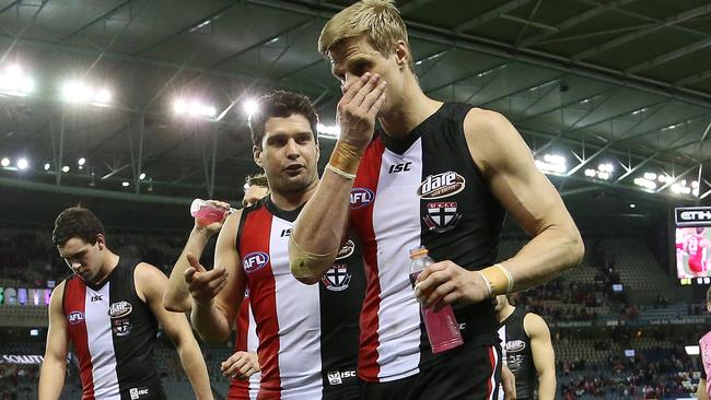 Leigh Montagna and Nick Riewoldt walk off Etihad Stadium last year after a big loss to Sydney. Picture: George Salpigtidis