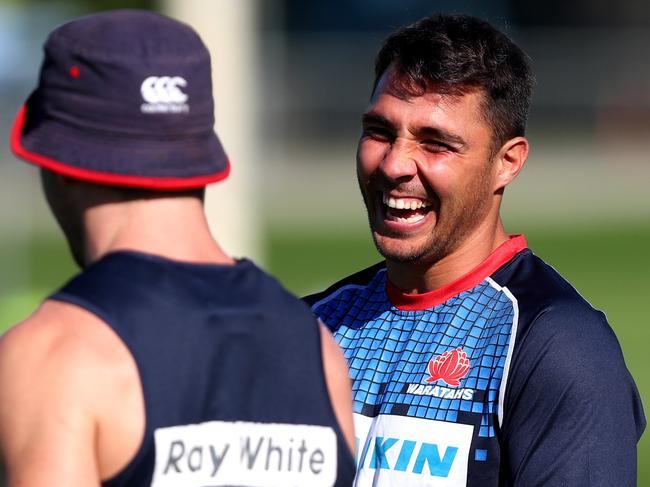 Nick Phipps shares a laugh with Bernard Foley during the Waratahs training session at  Bus Loop Oval, Moore Park . Picture : Gregg Porteous