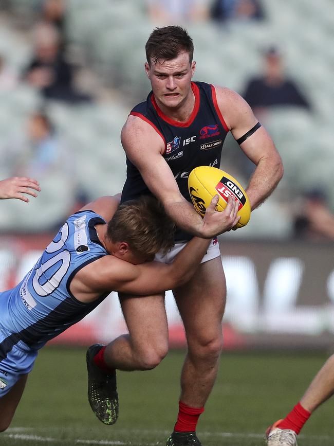 Gerloff under pressure from Sturt’s Sam Colquhoun. Picture: Sarah Reed