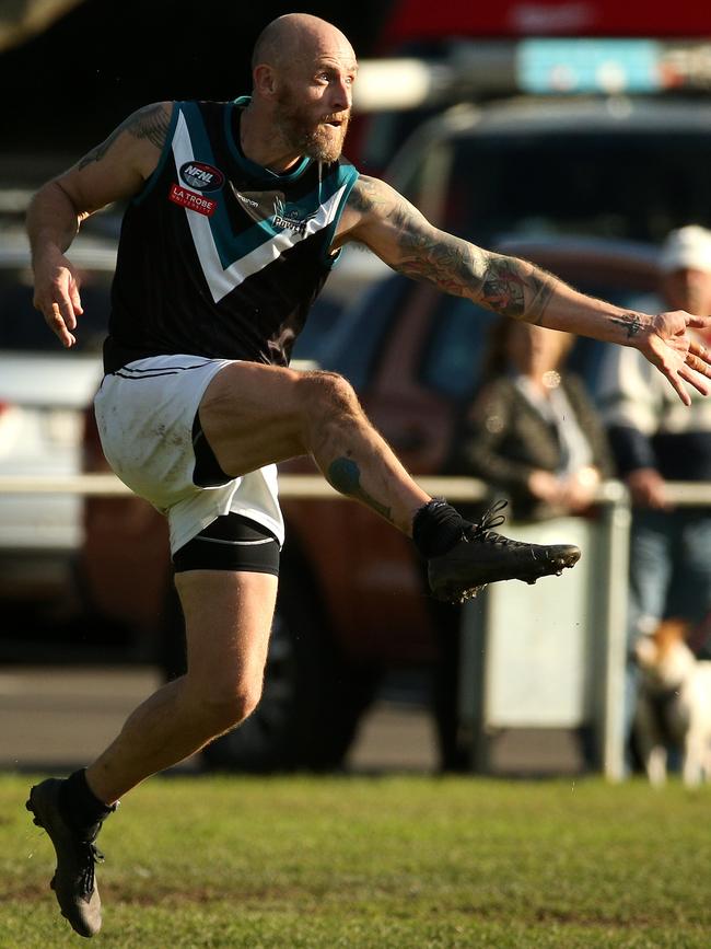 Alisdair Jackson kicks long for Laurimar. Picture: Hamish Blair