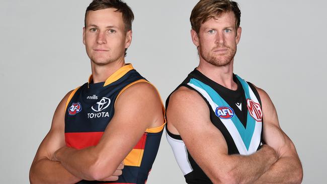 MELBOURNE, AUSTRALIA - MARCH 09: Jordan Dawson of the Crows and Tom Jonas of the Power pose during the 2023 AFL Captains Day at Marvel Stadium on March 09, 2023 in Melbourne, Australia. (Photo by Morgan Hancock/AFL Photos via Getty Images)