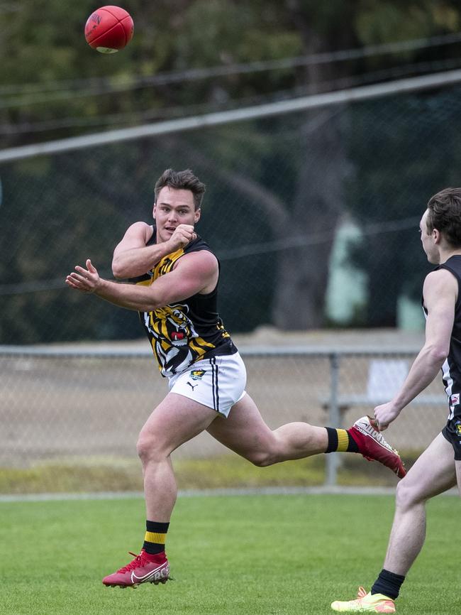 TSL: Glenorchy vs. Tigers, KGV: Tigers' Kieran Lovell feeds out a handball. Picture: LUKE BOWDEN