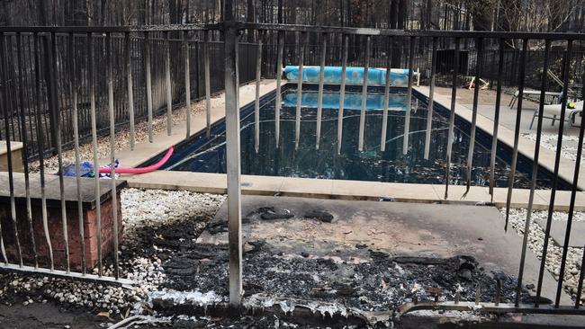 Flames burnt through the pool fence at Samantha Kneeshaw’s home. Picture: Supplied