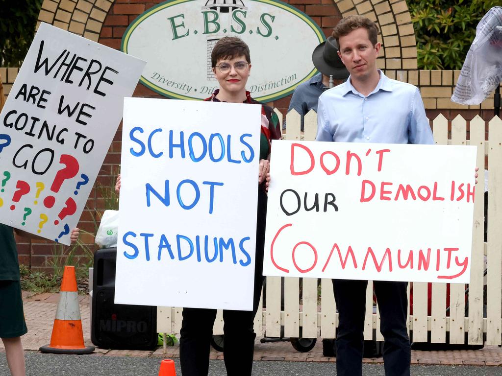 Greens MPs Amy MacMahon and Max Chandler-Mather, East Brisbane State School parents, students and residents rallying outside the Gabba. Picture: Steve Pohlner
