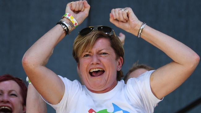 Christine Forster, the sister of former Prime Minister Tony Abbott, celebrates after watching the same sex marriage vote. Picture: AAP Image/David Moir.