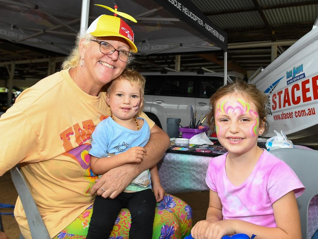 Well known and loved local face-painting sensation Donna Spotty Girl sharing her magic with Logan and Brianna Green at the Lismore Show. Picture: Cath Piltz