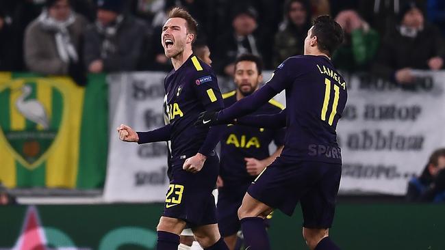 Tottenham Hotspur's Danish midfielder Christian Eriksen (C) celebrates.