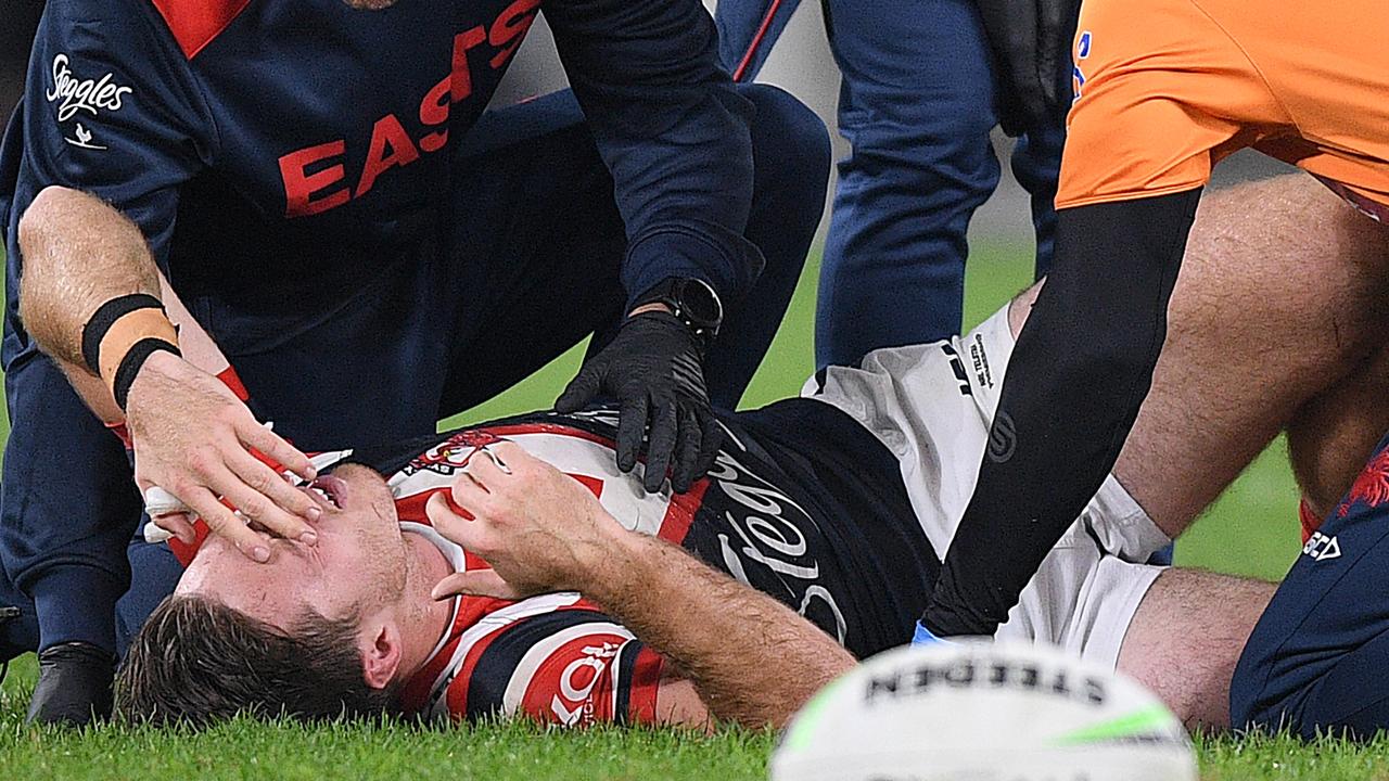 Sam Verrills down with an eye injury (AAP Image/Dan Himbrechts)