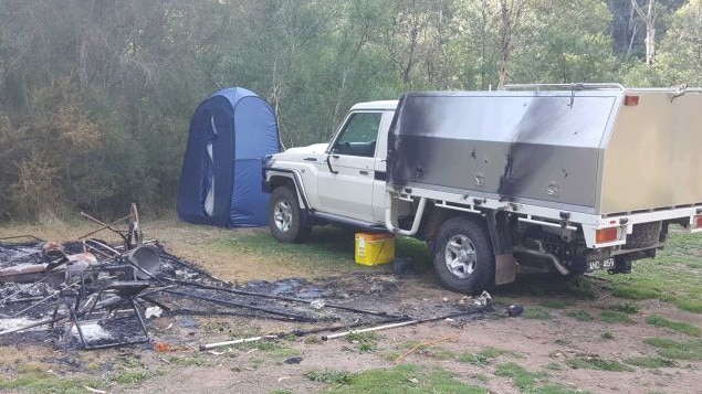 Russell Hill and Carol Clay's campsite was damaged by fire. Picture: ABC