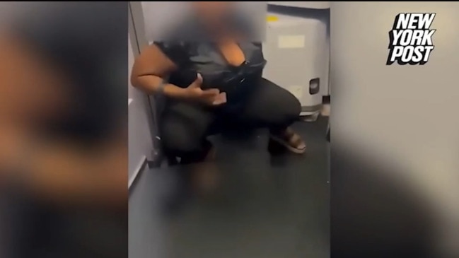 Shock as woman urinates on plane floor