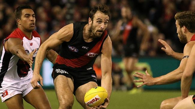 Jobe Watson and his midfield mates need to help the defenders. Picture: Wayne Ludbey