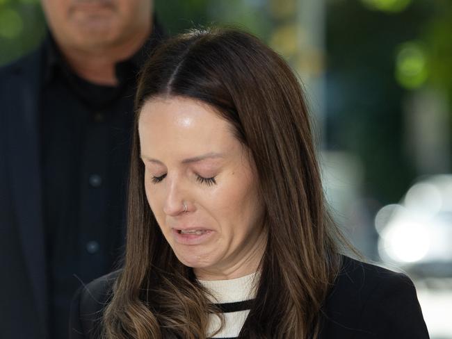 MELBOURNE AUSTRALIA - Newswire Photos MARCH 25TH 2023 : Brianna Sutcliffe, the fiance of pilot Ido Negev, who died in a mid-air collision near Mangalore Airport in Feb 2020, speaks to media outside the Coroners Court with family. First day of a four-day inquest into the deaths of four pilots. PICTURE : NCA Newswire / Nicki Connolly