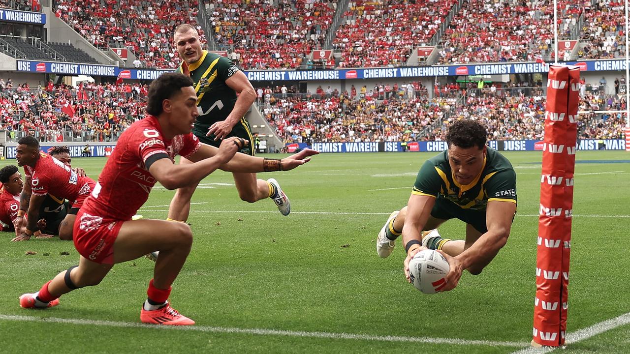 Watch: Tonga star dislocates elbow, Kangaroos running riot