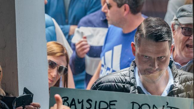 Locals and Brighton MP James Newbury protest against the Labor government’s housing plan on Sunday. Picture: Nadir Kinani/NewsWire