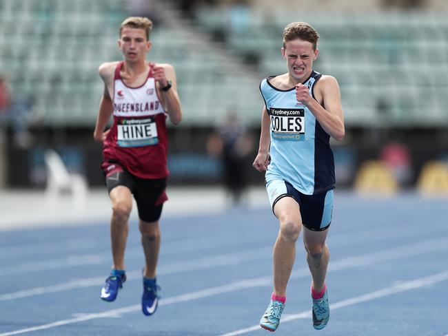 Liam Coles on his way to victory in the under-14 boys 200m final at the Australian Track and Field Championships at Sydney Olympic Park. Picture: Matt King