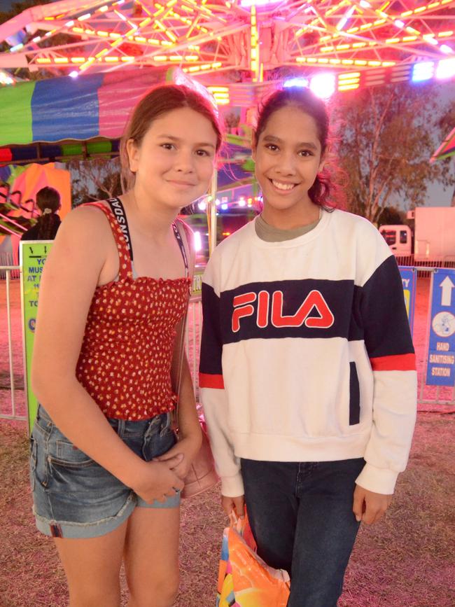 Kia King and Zahli Busch found plenty to see and do in sideshow alley at the Charters Towers Show. Picture: Trudy Brown