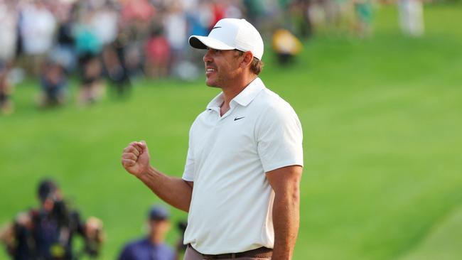 Brooks Koepka celebrates on the 18th green at the 2023 PGA Championship at Oak Hill Country Club. Photo by Kevin C. Cox / Getty Images via AFP