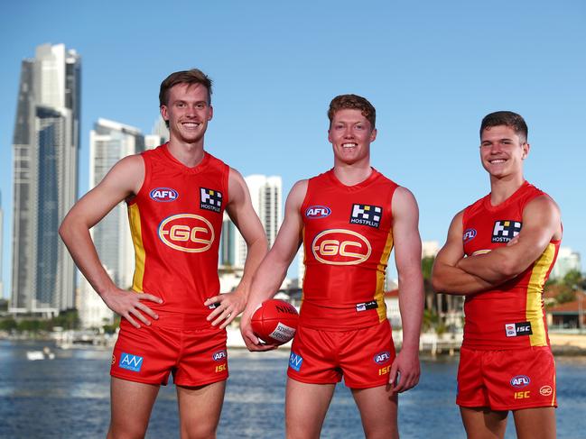 Noah Anderson, Matthew Rowell and Connor Budarick pose during a Gold Coast Suns AFL media opportunity at Evandale Park on March 19, 2020 in Gold Coast, Australia. (Photo by Chris Hyde/Getty Images via AFL Photos)