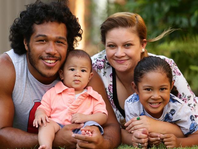 Agnatius Paasi with sons Manatoa, 4, Agnatius Jnr, 4 months, and partner Chloe. Pic by Luke Marsden.