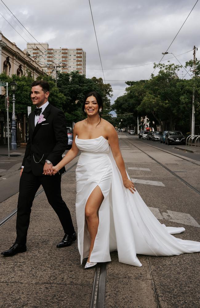 Bianca wore a stunning mikado sheath dress and overskirt created by Sam from The Bridal Curator - Prahran. Picture: Art of Grace/ /Stephanie Bailly.