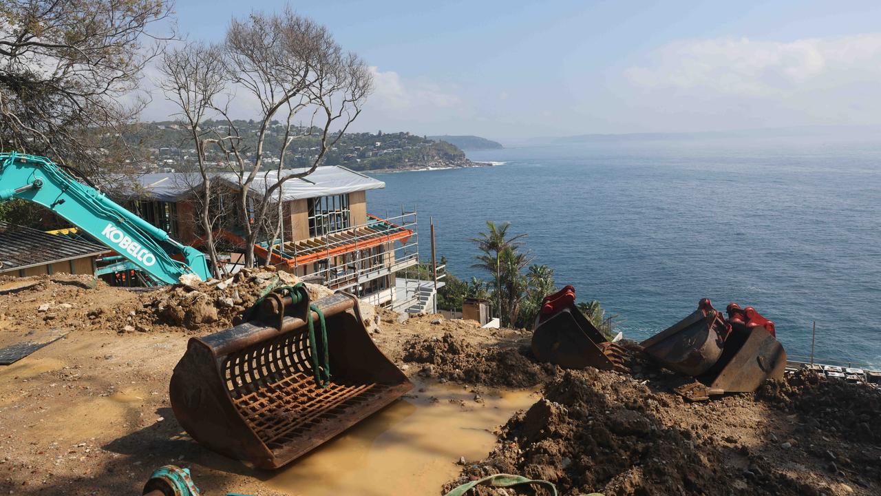 The house on the left is a separate property but is possibly being built by the same builder. Picture: David Swift