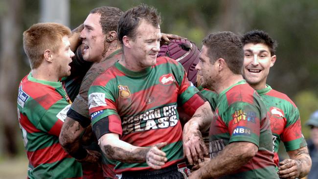 Umina's Todd Maloney (centre) is back helping the club as part of the coaching staff.